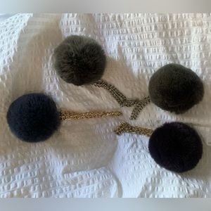 Fur bag charm pom-poms